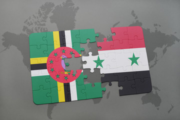 puzzle with the national flag of dominica and syria on a world map
