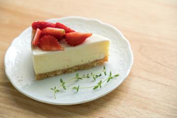 Strawberry cheese cake on wood table,Strawberry cake dessert.