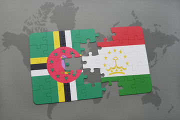 puzzle with the national flag of dominica and tajikistan on a world map