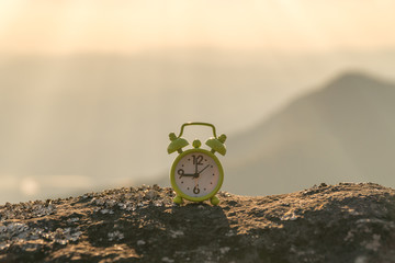 Vintage clock timer,Time for alert reminder concept,Daylight and vintage tone effect.