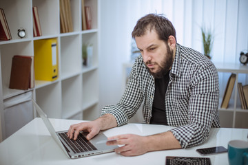 Hipster man in office