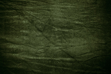 Texture of dark khaki crumpled fabric - obrazy, fototapety, plakaty