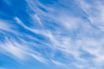 clouds in the blue sky as background