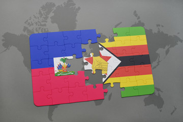 puzzle with the national flag of haiti and zimbabwe on a world map