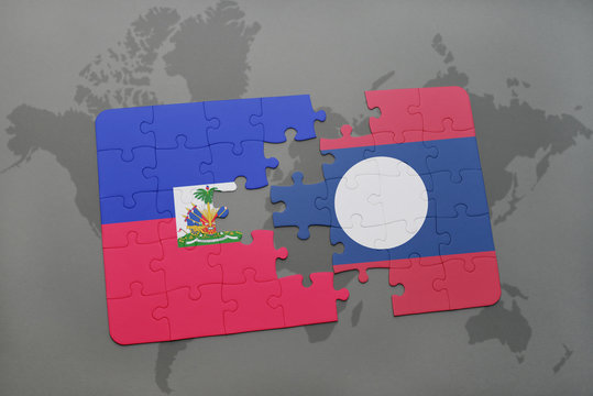 puzzle with the national flag of haiti and laos on a world map