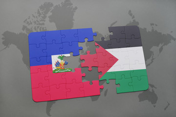 puzzle with the national flag of haiti and palestine on a world map