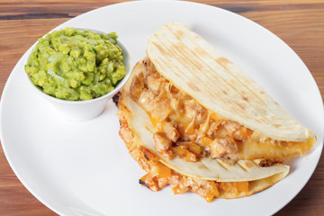 Quesadilla with guacamole sauce