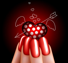 Glass angel heart in hand. manicure. glamour.