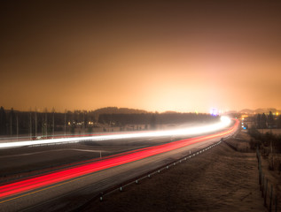 Light rays of cars on a highway