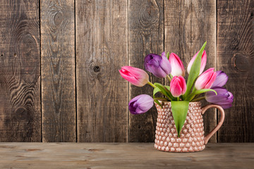 Fresh colorful tulips bouquet in jug