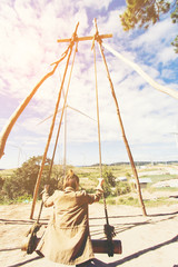 Women playing with swing toy