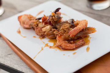 Deep fired shrimps serve with sweet fruit sauce