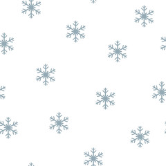 Seamless pattern of snowflakes and dots, blue on white
