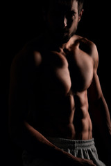 Fototapeta na wymiar Muscular body of attractive man
