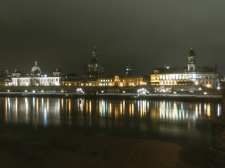 Fototapeta na wymiar Augustusbrücke, Elbufer Dresden at Night with view to Frauenkirche