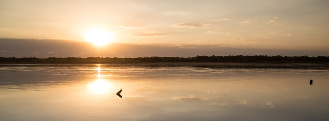 sunset on the lake as a backdrop