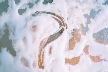 question mark from lather on shower cabin in the bathroom