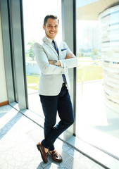 Portrait of a businessman looking at the window.