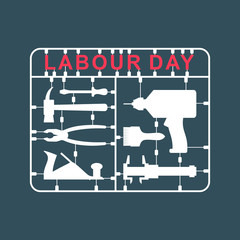 Labor Day is set of tools. Plastic kit with metalwork instrument. Drill and hammer. Screwdriver and brush. Slide caliper and plane