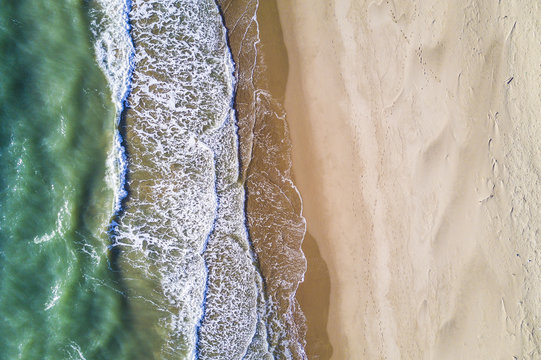 Aerial view of the Italian wild beach at sunset