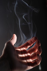  Hand of a man with smoke