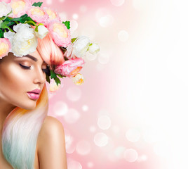 Blooming flowers wreath on woman's head. Flowers hairstyle