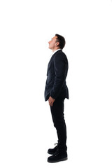 young man in a suit on a white background showing signs