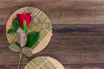  red roses on old wood background (valentine concept)