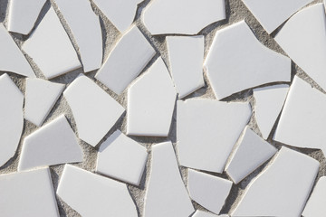 white ceramic irregular pattern, mosaic wall, vietri sul mare (italy)