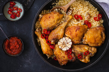 Fried chicken stew. Skillet Fried chicken with vegetable. Crispy fried chicken meat. Top view. slow-cooker chicken meat.