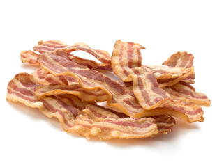 cooked crispy slices of bacon isolated on white background