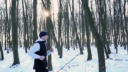 Running in the park among the trees