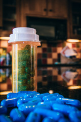 blue pills on kitchen counter top