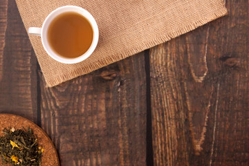 White cup of green tea