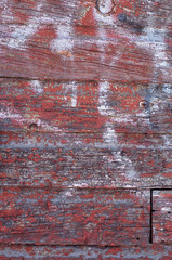 Vertical Pealing Textured Paint on Old Wooden Wall