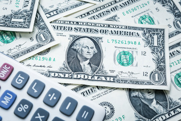 Calculator with american dollars, United states money, finance concept