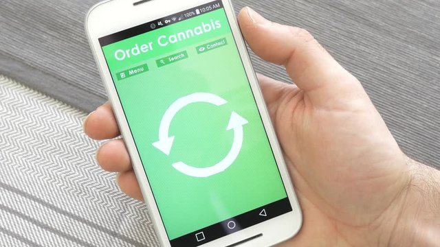 Shopping for marijuana on a smartphone device.