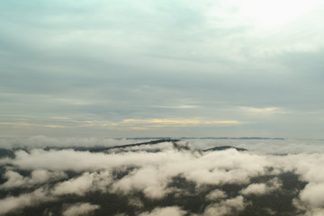 Fototapeta na wymiar mountain landscape,morning mist with blue sky background