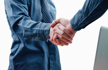 Businessmen shaking hands, isolated on white background