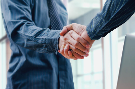 Business people shake hand for partnership and friendship