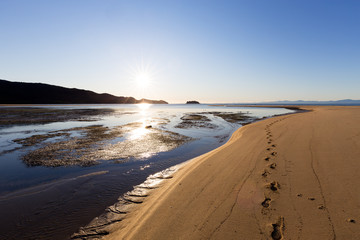 Footprints on the Sandbars at Low Tide in New Zealand