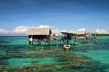 Sea gypsies houses on stilts in Tebah Batang, Lahad Datu,, Sabah, Borneo, Malaysia.	