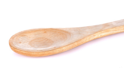 Wooden spoon on white background