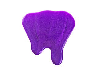 Spilled violet nail polish isolated on white background