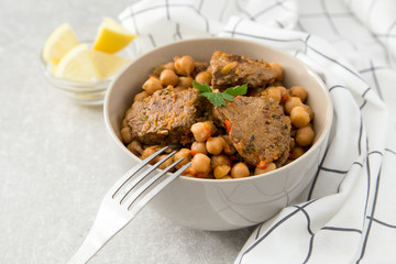 chickpeas with meat with vegetables and greens