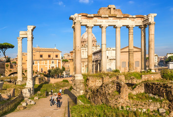 Rome, Italy. The ruins of the Roman Forum: on the left - the temple of Vespasian and Titus (Tempio...