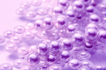 Shining string of white pearl in water