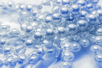 Shining string of white pearl in water