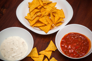 Nachos chips. Tortilla snack with salsa
