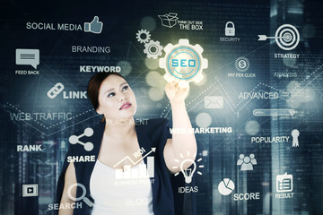 Overweight businesswoman and SEO button